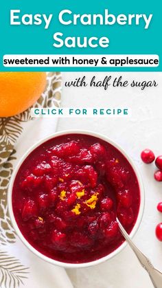 cranberry sauce in a bowl with oranges on the side