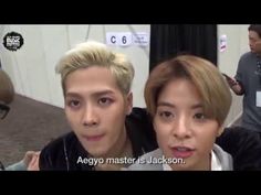 two young men sitting next to each other in front of a microphone with the words aegyo master is jackson on it