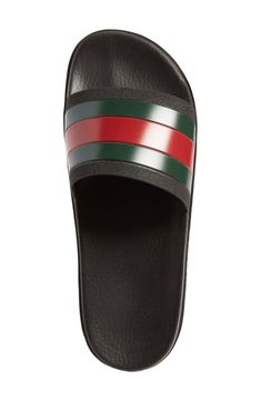 High fashion and street art brilliantly merge on this graffiti-patterned slide from the fall/winter 2016 collection, the result of an electric collaboration between Gucci creative director Alessandro Michele and envelope-pushing artist GucciGhost. Style Name:Gucci Slide Sandal (Men). Style Number: 5214425. Modern Slip-on Slides For Streetwear, Leather Slides For Streetwear, Gucci Leather Slides, Trendy Slip-on Slides For Streetwear, Gucci Black Leather Slides, Black Leather Gucci Slides, Gucci Casual Slip-on Slides, Casual Gucci Slip-on Slides, Black Casual Gucci Slides