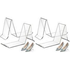 three clear acrylic shelves with heels on each side and one in the middle