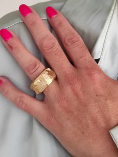 A super stylish thick band ring from our new Rocky designs, created totally by hand from durable gold plated NB464 that never fades away.. a sculptured ring designed by Elisa Kuno. A truly unique brutal hammered design. The comfort fit will hug smoothly your finger.. definitely you will be very proud to wear in any occasion! the widest point on top is about 12MM. A few words for NB464: Like Titanium it's a new material on jewelry production, Naval brass is used on shipbuilding because of the har Thick Band Ring, Wide Band Ring, Hammered Ring, Chunky Ring, Gold Statement Ring, Hammered Rings, Dome Ring, Gold Wedding Ring, Chunky Rings