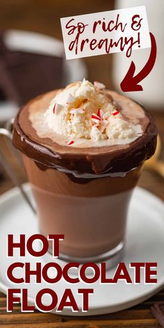 hot chocolate float with whipped cream and sprinkles in a cup on a saucer