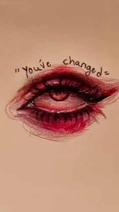 an eye with the words you're changed written on it and red lipstick in front of