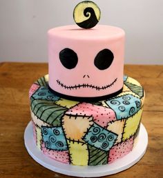 a decorated cake with a jack skelling on top