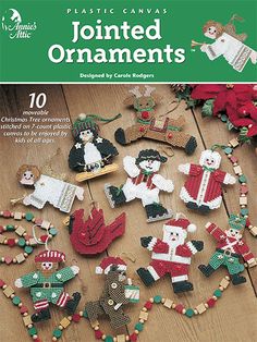 knitted christmas ornaments are displayed on the cover of a knitting book, which features an image of santas and snowmen