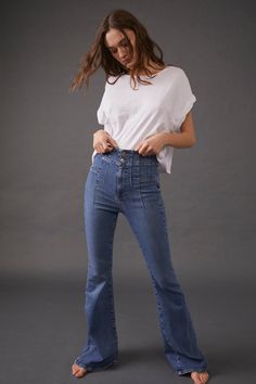 A good fit... Our favorite flare jeans from Free People. These retro-inspired, flattering flares are so comfortable with the stretch fabric and super high rise. Do your backside a favor and put them in these top-rated pants. Features: Women's denim flare jeans Button closure Exaggerated yoking Semi-stretch fabrication Super high-rise flared silhouette Materials/Care: 2% Elastane, 7% Polyester, 91% Cotton Machine washable Gauze Pants, Denim Flare Jeans, Jeans Button, Denim Flares, Indigo Blue, Retro Inspired, Summer Sale, Denim Women, Bell Bottom Jeans