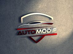 the logo for an automobile company is shown in red and silver colors on a gray background