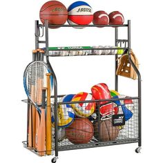 a metal rack with various sports equipment on it and balls in the basket next to it