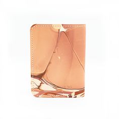 Marbled Leather - Neutral Color Palette Calling all world travelers! This passport holder is hand crafted from high quality vegetable tanned leather and designed with two card slots for easy access to your travel essentials while keeping your passport safe and secure. Make it shine with custom gold foil monogramming. High quality leather Two inner slip pockets Dimensions 5.5"L, 5.25"W Modern Brown Card Holder For Travel, Brown Rectangular Card Holder For Travel, Neutral Purple, All World, Leather Passport Cover, Passport Cover, Neutral Colour Palette, World Traveler, Neutral Color