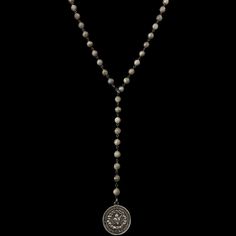 The Sacred Heart Lariat Necklace is made of faceted labradorite joined by gunmetal wire and a gunmetal clasp that allows it to be placed on any bead and worn several different ways. Known as the Sante Vierge medallion, it features the Sacred Heart on one side and the Madonna on the reverse. This medal is recast from the vintage original in Sterling Silver. It is French in origin. The Sterling Silver mark .925 is found on the edge of the medal, just below Her feet. Made in the USA in our sweet st Bohemian Silver Hand Knotted Jewelry, Adjustable Silver Hand Knotted Necklace, Silver Hand Knotted Adjustable Necklace, Silver Bohemian Jewelry, The Madonna, Immaculate Heart, Queen Of Heaven, The Sacred Heart, St Michael