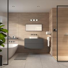 a bathroom with a large tub, sink and shower in the corner next to a potted plant