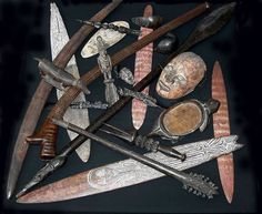 an assortment of different types of knives on display