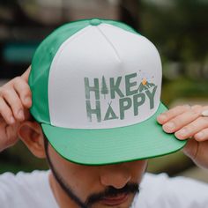 Elevate your outdoor style with our 'Hike Happy' trucker hat! Designed for the adventurous soul, these trucker hats capture the essence of hiking, camping, and mountaineering. Embrace the peaks, conquer the mountains, and express your love for the great outdoors. The perfect gift for the hiking lover, camper, or mountain climber in your life. Hiking Family, Baseball Trucker Hat, Student Discounts, Happy Camper, School Sports, Happy Campers, Outdoor Style, Mountaineering, Personalized Family