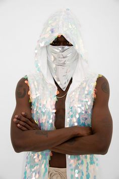 You will love this mens sequin hooded vest! FULLY SEQUINED FABRIC : Shine brighter than ever before and turn heads with bold, sparkly designs with a pair of Studio 54 Fashion Mens Sequined Hooded Vest Kimono Jacket and shine a light on how good you look! The fabric is completely handcrafted with extra big types of sequins.  FLATTERING RELAX CUT : These sequin festival duster feature a strong silhouette and has a very cool hood! The lining is sewn on the inner part of the joints and it never both Studio 54 Fashion, Duster Outfit, Festival Kimono, Rave Outfits Men, Outfit Rave, Festival Outfits Men, Sequin Vest, Sequin Kimono, Man Outfit