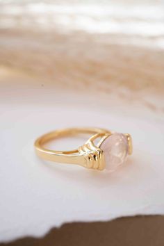 D E T A I L S — METAL: Gold Plated 18k: Gold plated jewelry has a layer of gold covering a base metal. — Stone: Rose Quartz. 💎 The gemstone is The Rose Quartz. ✦Rose Quartz, the crystal of Unconditional Love, it's considered a stone of the heart. It carries a soft feminine energy of compassion and peace, nourishment and comfort. 💎 The natural gemstone can vary in color, shape or size. BACK SIDE OF THE RING: The metal band of our rings is never completely covering the gem from the back side, so Oval Gold Crystal Promise Ring, Gold Plated Gemstone Crystal Ring, Gold-plated Gemstone Crystal Ring, Gold-plated Crystal Ring With Gemstone, Gold Crystal Ring With Gemstone In Fine Jewelry Style, Fine Jewelry Gold Crystal Ring With Gemstone, Gold Crystal Ring Tarnish Resistant, Gold Tarnish Resistant Crystal Ring, Fine Jewelry Gold Crystal Ring