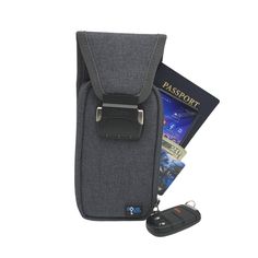 a cell phone, passport, and car keys in a pouch on a white background