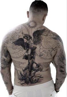 the back of a man with tattoos on his body