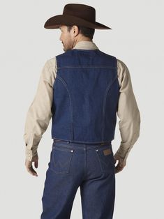 Men's Unlined Denim Vest by Wrangler 74130PW For dressier occasions, have this Western staple in your closet. With traditional Western styling, our denim vest features front pockets with 'W' stitching. With buttons, not snaps. 100% Cotton, 14.75 Oz. Color: Denim 100% Cotton Imported Machine Wash Traditional western styling Front pockets with w stitching Buttons Vest Denim Vest Men, Cowboy Vest, Boys Cowboy Boots, Western Vest, Girl Cowboy Boots, Twisted X Boots, Slack Pants, Grey Long Sleeve Shirt, Men's Jackets