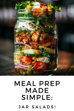 a mason jar filled with vegetables and meats on top of a wooden table text reads meal prep made simple jar salad