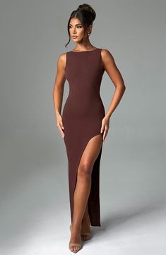 Kassandra is our timeless, chic maxi, cut with a boat neck that fastens to the back neck with a button. This maxi is made from our luxury stretch crepe with a thigh high shaped split and low scoop back. 



Colour: Chocolate.

Luxury stretch crepe.

Fully lined.

High boat neckline.

Button closure on back neck.

Low scoop back.

Thigh high shaped split.

Invisible zipper to the reverse.

Maxi length.

Model is an XS and is wearing an XS.

 Size: XS, S, M, L, XL, XXL Formal Bodycon Dress, High Neck Dresses, Homecoming Dresses Corset, Midi Dress Wedding Guest, Long Sleeve Homecoming Dresses, High Neck Maxi Dress, Timeless Chic, Homecoming Dresses Long, Boat Neck Dress