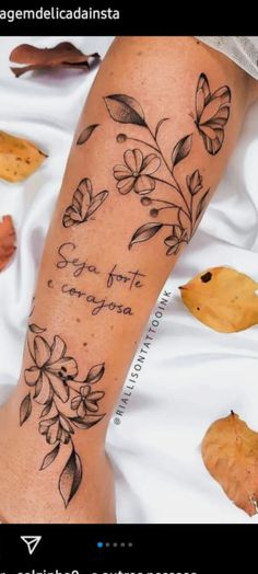 a woman's leg with tattoos on it and leaves around her ankles, the words sara fonte composa written in black ink