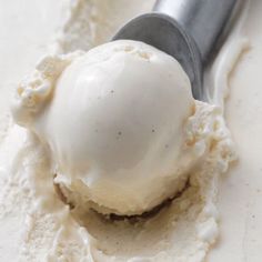 a scoop of ice cream sitting on top of a table