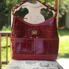 Limited Edition. Exclusive. Rare In This Color. Brand New Without Tags. Perfect Condition. Approximate Measurements: Height: 10-12” Length: 12” Width: 4” Strap: 17” Wa13 Luxury Red Bag With Zipper Pocket, Classic Red Bag With Zipper Pocket, Classic Red Bags With Zipper Pocket, Dooney And Bourke, Dooney & Bourke Bags, Zipper Bag, Dooney & Bourke, Zipper Bags, Dooney Bourke