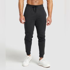 Gymshark Crest Joggers Slim Fit Sizes Xs, S, M, Xxl, 3xl Gymshark Joggers, Gymshark Black, Pink Polka Dot Dress, Adidas Track Suit, Gymshark Women, Black Sweatpants, Compression Pants, People Shopping, Mens Joggers