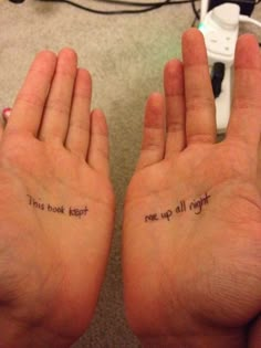 two hands with tattoos that say, this book keeps new up all night