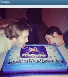 two men look at a cake with the words congratulationss flex and million bros on it