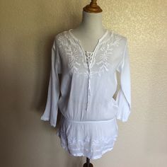 Lrl Lauren Jeans Co. Ralph Lauren Embroidered Gauze Drop Waist Top M White Excellent Condition Washed But Never Been Worn Size Medium Excellent Condition Like New Washed, Never Worn Elastic Drop Waist White Color Gauze Embroidered Front, Neck, And Hem Ties On Front, Lace Up Long Sleeve Boho Bohemian Size On Tag Says 2x But Top Is Really A Size M Bust Across - 21 Inches Length - 28 Inches Pet-Free Smoke-Free Home Ships Same Day Or Next Day Experienced Seller I070(Pmd) Summer Embroidered Long Sleeve Top With Lace Trim, Summer Long Sleeve Embroidered Top With Lace Trim, Casual Long Sleeve Embroidered Beach Top, Casual Long Sleeve Embroidered Top For Beach, Embroidered Long Sleeve Summer Tops, Summer Embroidered Long Sleeve Tops, Embroidered Tunic Blouse For Beach, Summer Beach Embroidered Top With Lace Trim, Embroidered Summer Blouse For Beach