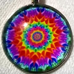 This Is A Beautiful, Handmade, Mandela Pendant Necklace. It Is Perfect For Those Who Are Into Chakras, Crystals, Yoga, Buddhism, And More! It Is Very Brightly Colored And Detailed. The Pendant Measures 25mm Or 1". It Comes With A Silvery Chain. I Hope You Like It, And Thanks For Stopping By. Feel Free To Leave A Fair Offer. :) Chakras Crystals, Mrs Necklace, Yoga Chakra, Jewelry Sets Handmade, Gold Leaf Pendant, Heart Choker Necklace, Star Necklace Gold, Stone Choker, Pearl Necklace Earrings