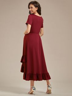 Step into motherhood in style with this stunning Ruffles High Low Hemline V-Neck dress, designed to make you feel like the goddess you are. Made with high stretch material to accommodate your growing bump, this dress features beautiful ruffle detailing and a contemporary high-low hemline that exudes sophistication and elegance. Make a statement at your next formal event or photo shoot and feel confident and chic in this fabulous maternity dress! Fit: Please refer to size chart. Length: Knee leng Maternity Dress With Surplice Neckline, Elegant Flowy V-neck Maternity Dress, Elegant V-neck Maxi Dress For Maternity Wear, Solid Color V-neck Maternity Dress, Solid V-neck Maternity Dress, Maternity V-neck Dress With Ruffles, Spring Maternity V-neck Dress With Ruffles, V-neck Maternity Dress With Ruffles, Ruched V-neck Maternity Dress