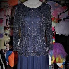 Navy Blue Dress With Sequins Blue Evening Dress For Holiday, Blue Evening Dresses For Holiday, Blue Holiday Evening Dresses, Navy Fitted Evening Dress, Blue Evening Dress For Holiday Night Out, Blue Long Sleeve Evening Dress For Dinner, Blue Holiday Dresses For Formal Occasions, Blue Holiday Formal Dress, Blue Formal Dresses For Holiday