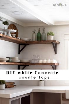 a kitchen with open shelving and white countertops