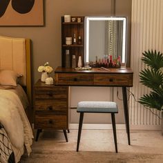 a bedroom with a bed, desk and mirror