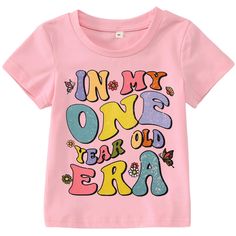 a pink t - shirt with the words in my one year old era printed on it