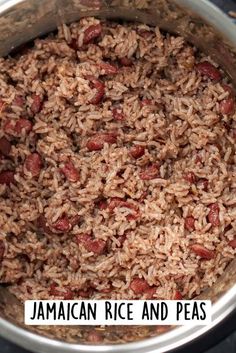 a pot filled with rice and beans on top of a stove