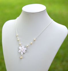 Featuring Gardenia Centered Necklace. MATERIAL AND MEASUREMENT: Gardenia size : approx 30mm. Flower glued on Filigree. The entire length of the necklace approximately 16.1/2 inches with 2 inches extender, finished with lobster clasp. I am happy to adjust the length per request. 6-8mm White Swarovski Pearls (pictured) . Glass Pearls Available. Silver Plated chain. Antique Brass , Gold plated available. Packed in a Gift box. SHIPPING TIME: The pictures are only for sample. Most Items are made to o White Flower Pendant Necklace For Wedding, Pearl White Flower-shaped Jewelry With Flower Charm, Pearl White Flower Charm Jewelry, Pearl White Jewelry With Flower Charm, White Flower Bridal Necklace As Gift, White Gardenia, Jewelry White, Floral Jewelry, Necklace White