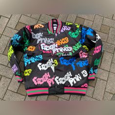 One Of The Most Classic Black Television Shows Ever Aired!! Fresh Prince Of Bel Air !!! Starting Will Smith !! This Colorful Limited Satin Jacket Is A Must Have !! Standard Fitment !! Insulated High Quality Satin Jacket !! Clean Printed Logos!! Send Your Size Inquires Many Available !! Trendy Multicolor Letter Print Outerwear, Multicolor Letter Print Outerwear For Streetwear, 90s Graphic Print Outerwear For Fall, 90s Style Graphic Print Outerwear For Fall, Multicolor Letter Print Outerwear For Fall, Retro Graphic Print Varsity Jacket For Spring, Retro Varsity Jacket With Graphic Print For Spring, Retro Spring Varsity Jacket With Graphic Print, Spring Retro Varsity Jacket With Graphic Print