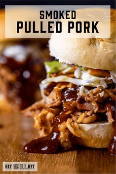 pulled pork sandwich with bbq sauce and slaw on a wooden cutting board text reads smoked pulled pork