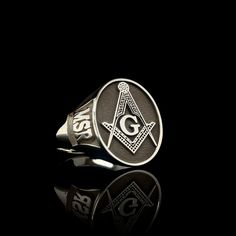 Masonic Rings with Lodge Number, Freemason Ring, Masonic Rings, Master Mason Rings, Free Mason Ring, Mens Masonic Rings  This product is GUARANTEED for life. - College graduation rings for men and women delicately engraved with your school logo or any other initials or image you want. - The ring has solid back. Deep and detailed engraving very delicately handcrafted unisex - looks super cool on both women & men - The ring is 925 Silver - Please contact me for your 14 carat and 18 carat solid gol Graduation Rings College, Mason Ring, Freemason Ring, Free Mason, Unisex Looks, Graduation Rings, Masonic Ring, Jewelry Workshop, Ring Mens