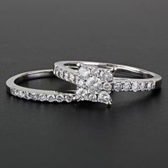 two white gold rings with diamonds on them