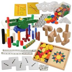 a variety of wooden toys and tools are shown