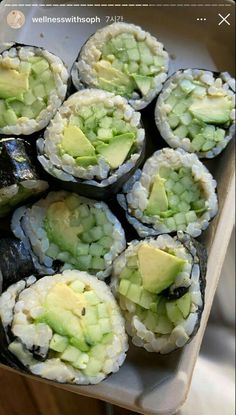 sushi rolls with avocado and cheese on top