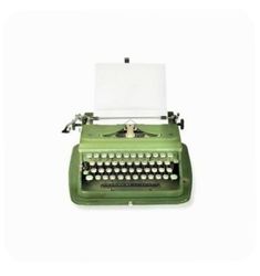 an old - fashioned green typewriter with white paper on it's top, against a white background