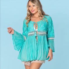 Brand New With Tags Absolutely Stunning Made Of The Highest Quality Tie Front Closure Bell Sleeves Lace Accents We Are A Licensed Retailer For Ranee’s Resort Wear Casual Turquoise Beach Blouse, Green Long Sleeve Cover-up For Day Out, Green Long Sleeve Tops For Beach Cover-up, Green Long Sleeve Beach Cover-up Top, Long Sleeve Green Top For Beach Cover-up, Bohemian Turquoise Long Sleeve Blouse, Turquoise Long Sleeve Tops For Vacation, Bohemian Turquoise Blouse For The Beach, Chic Turquoise Top For Beach