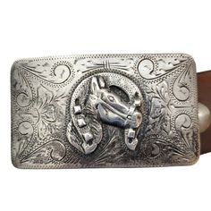 Vintage Sterling Silver Horse Head Shoe Belt Buckle .925 ALC Guadalajara Mexico Embossed Brown Leather Belt 39.5"-45.5" X 1.5" Buckle Measurements - 3.5" X 2" Buckle Weight - 74.96g Size: Mens 3.5" X 2" Condition: Pre-Owned Classic Formal Jewelry With Horse Design, Western Engraved Formal Jewelry, Western Engraved Jewelry For Formal Occasions, Western Style Engraved Formal Jewelry, Western Style Jewelry With Silver Buckle For Formal Occasions, Formal Western Jewelry With Silver Buckle, Cowboy Rodeo, Western Belt Buckles, Silver Horse