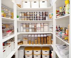 an organized pantry filled with lots of food and storage bins on the bottom shelf