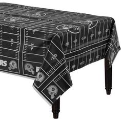 a football field tablecloth with skulls on it